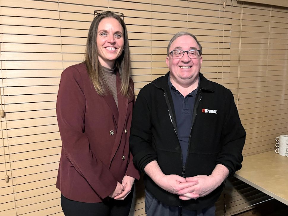 Tara Pettinger, Executive Director of the Portage District General Hospital Foundation, standing with Joe Masi, chair of the foundation board, at a Rotary meeting at Canad Inns in Portage la Prairie on May 5.